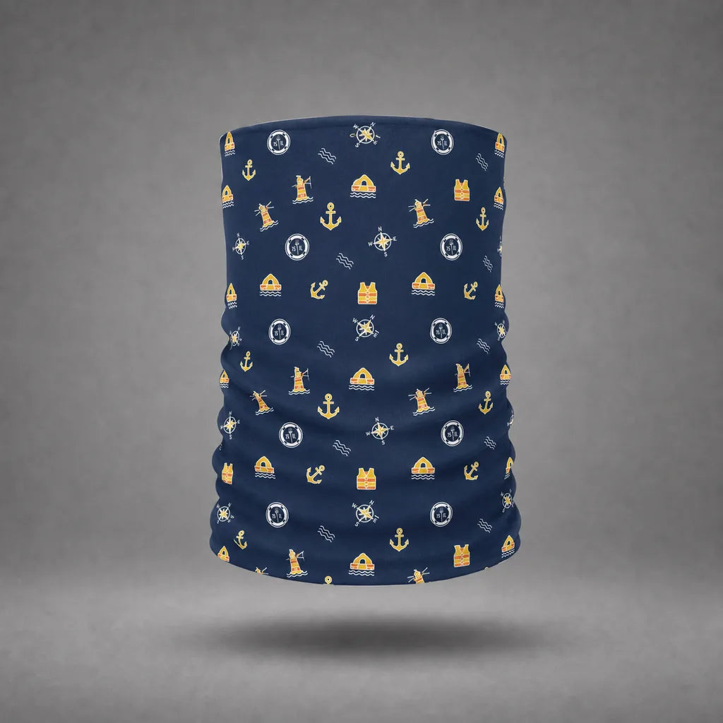 Navy Bosun neck gaiter with yellow and orange maritime safety pattern, floating above a grey studio floor with a soft shadow.