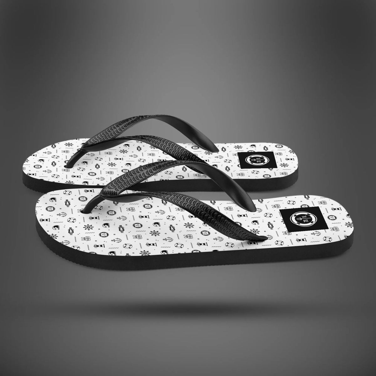 Marine Life flip flops in side view, white soles with a black nautical icon print