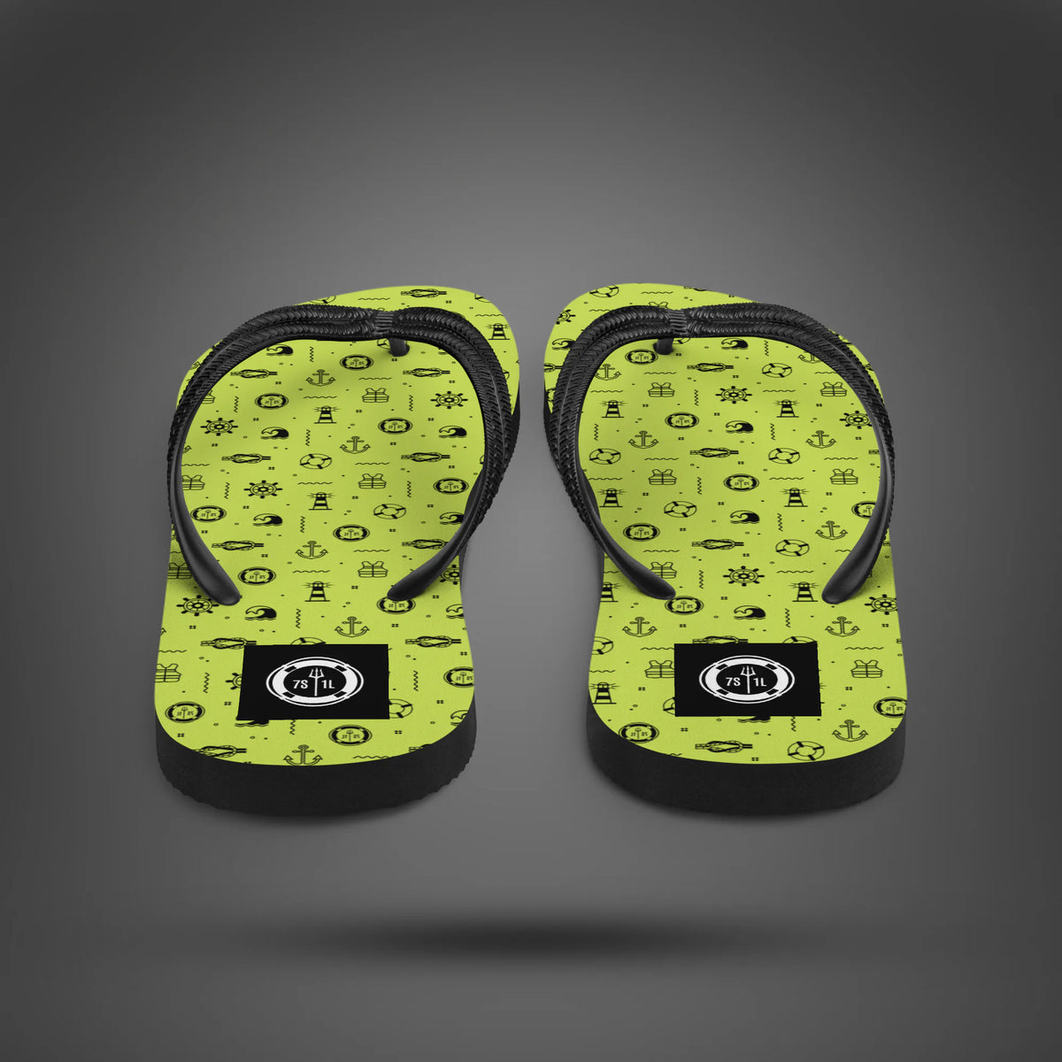 Nautical Summer flip flops seen from the heel, lime green soles with black nautical icons and black straps
