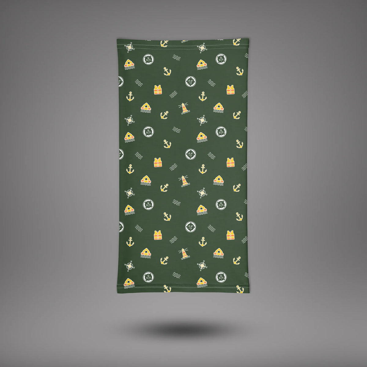 Ocean Adventure neck gaiter laid flat, green fabric with gold nautical icons