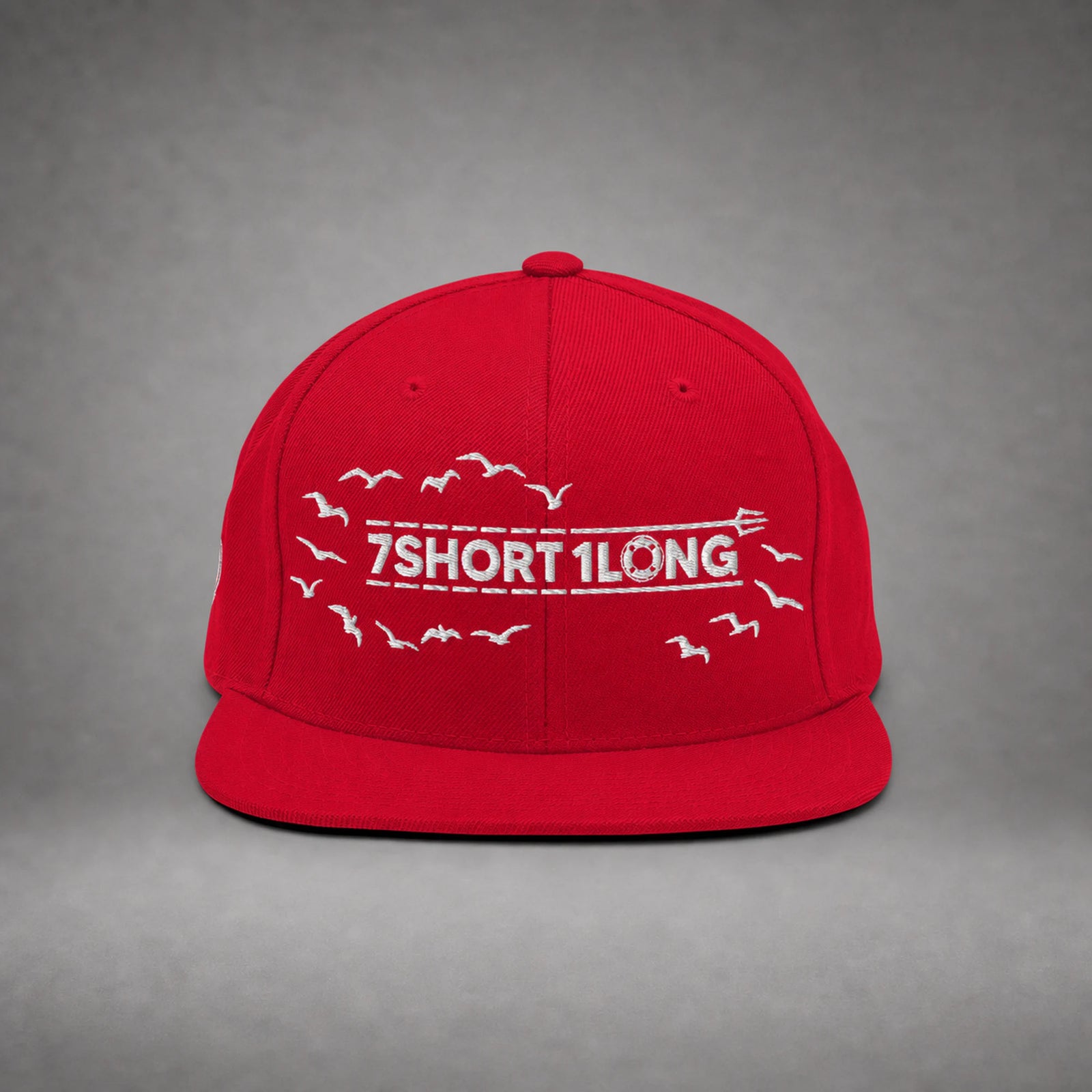 Red Seagulls snapback cap shown from the front in a gray floating studio.