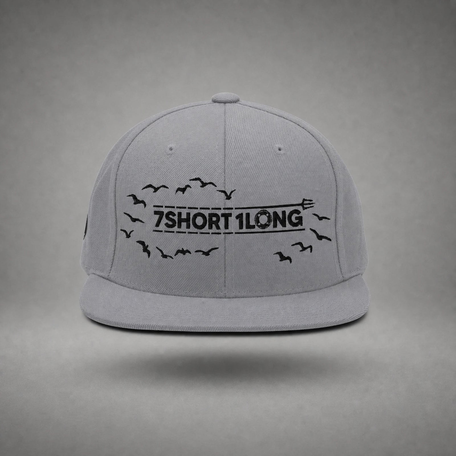 Silver Seagulls snapback cap shown from the front in a gray floating studio.