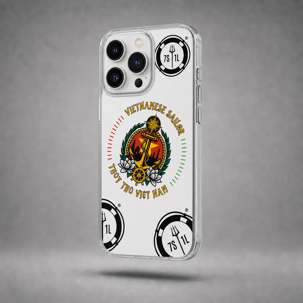 Clear Vietnamese Sailor case for iPhone 13 Pro with maritime anchor artwork, floating above a grey studio floor with a soft shadow.