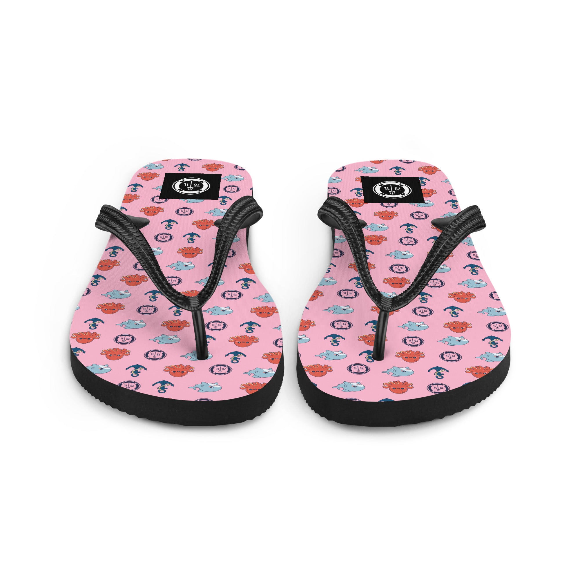 Pair of pink flip-flops with black straps nautical pattern on a white background