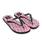 Pair of candy pink flip-flops with maritime pattern