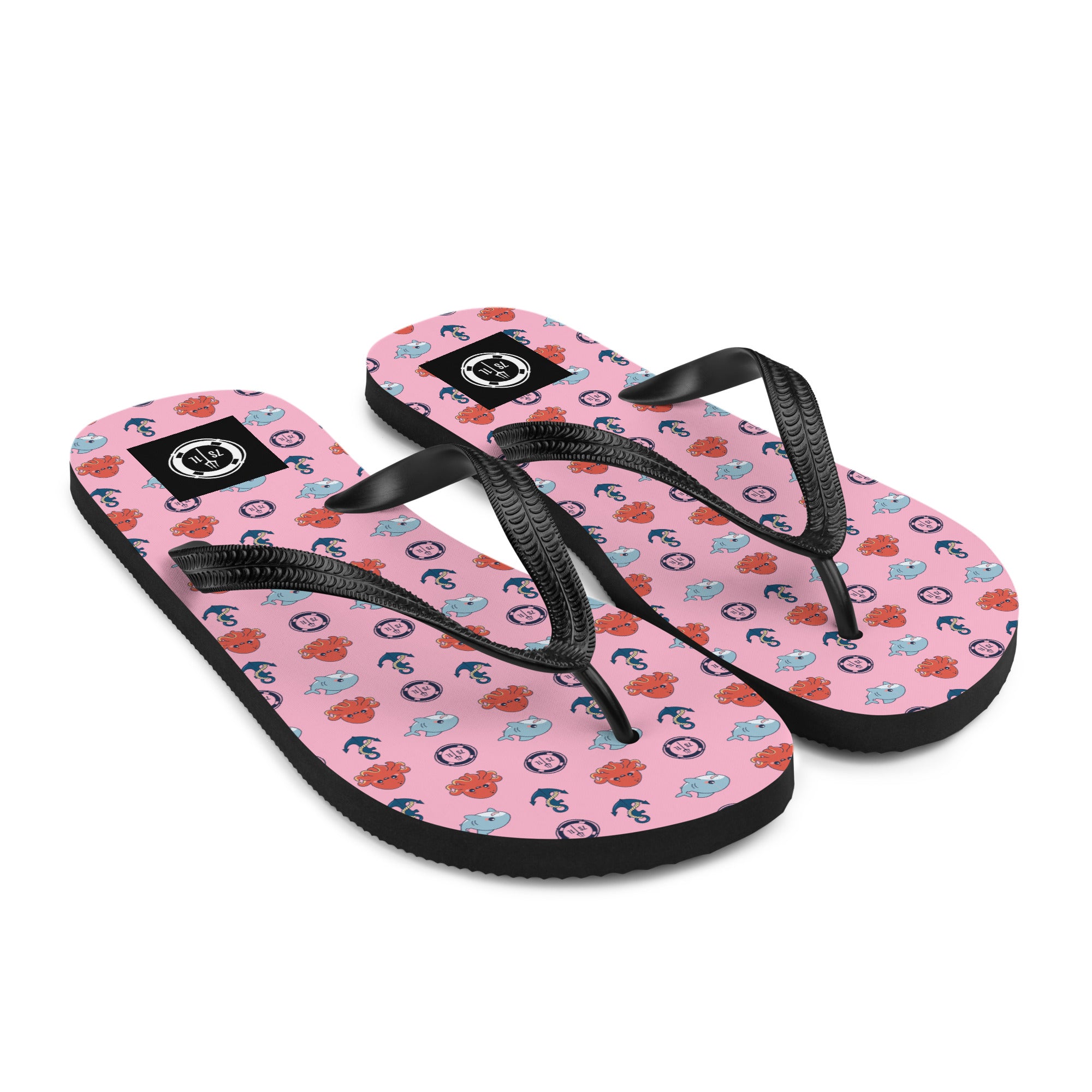 Pair of candy pink flip-flops with maritime pattern