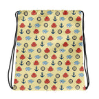Drawstring bag with nautical pattern featuring octopuses, anchors, and shark on a sunny yellow background.