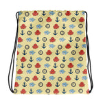 Drawstring bag with nautical pattern featuring octopuses, anchors, and shark on a sunny yellow background.