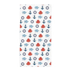 Towel with nautical pattern featuring octopuses, sharkd, and anchors on a white background