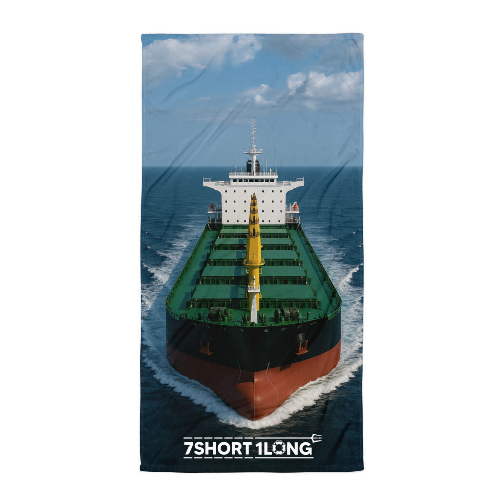 Towel with a ship design and '7Short1Long' branding on a white background
