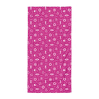 Pink towel with white icons of the sea on a white background