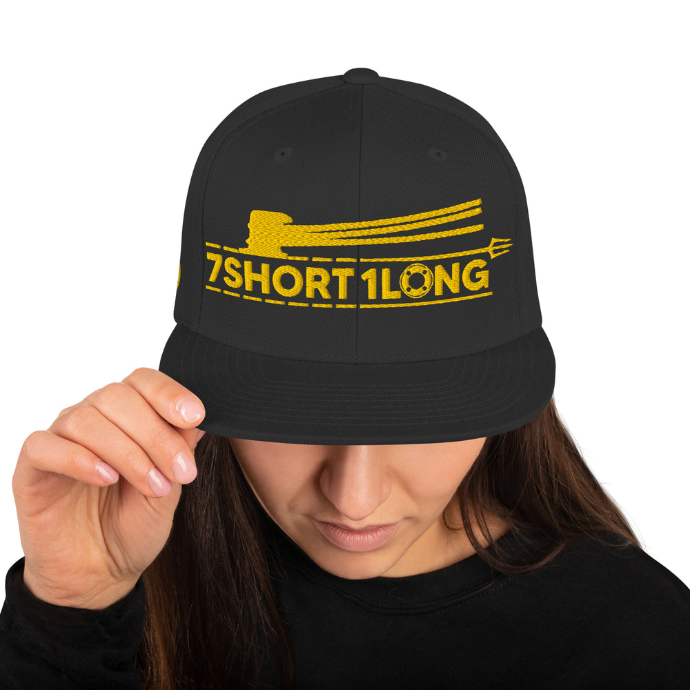 Snapback cap with 7-Shot-One-Long logo and mooring lines design, inspired by ship mooring operations and bringing lines ashore, adjustable snapback closure.