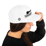 Snapback cap with 7-Shot-One-Long logo and mooring lines design, inspired by ship mooring operations and bringing lines ashore, adjustable snapback closure.