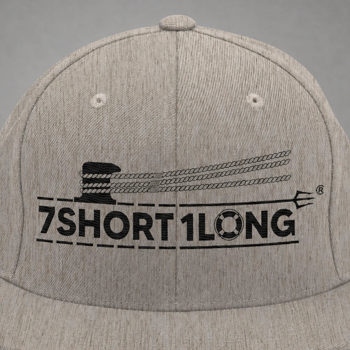 Close view of the Deck Hand rope and signal embroidery on a heather grey snapback cap.