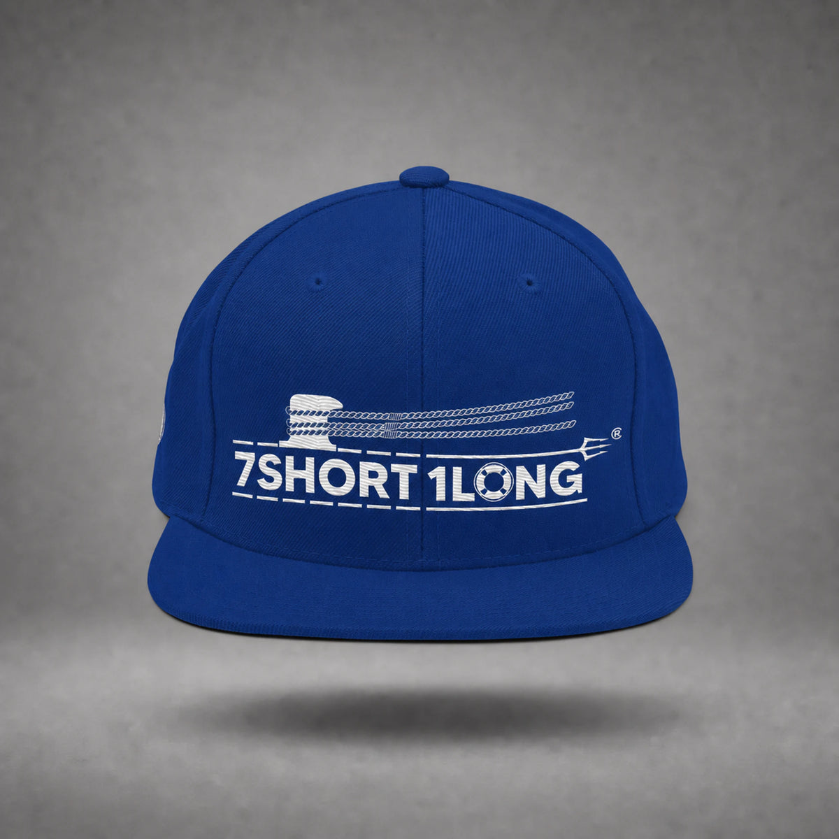 Royal Blue Deck Hand rope and signal snapback cap shown from the front in a gray floating studio.