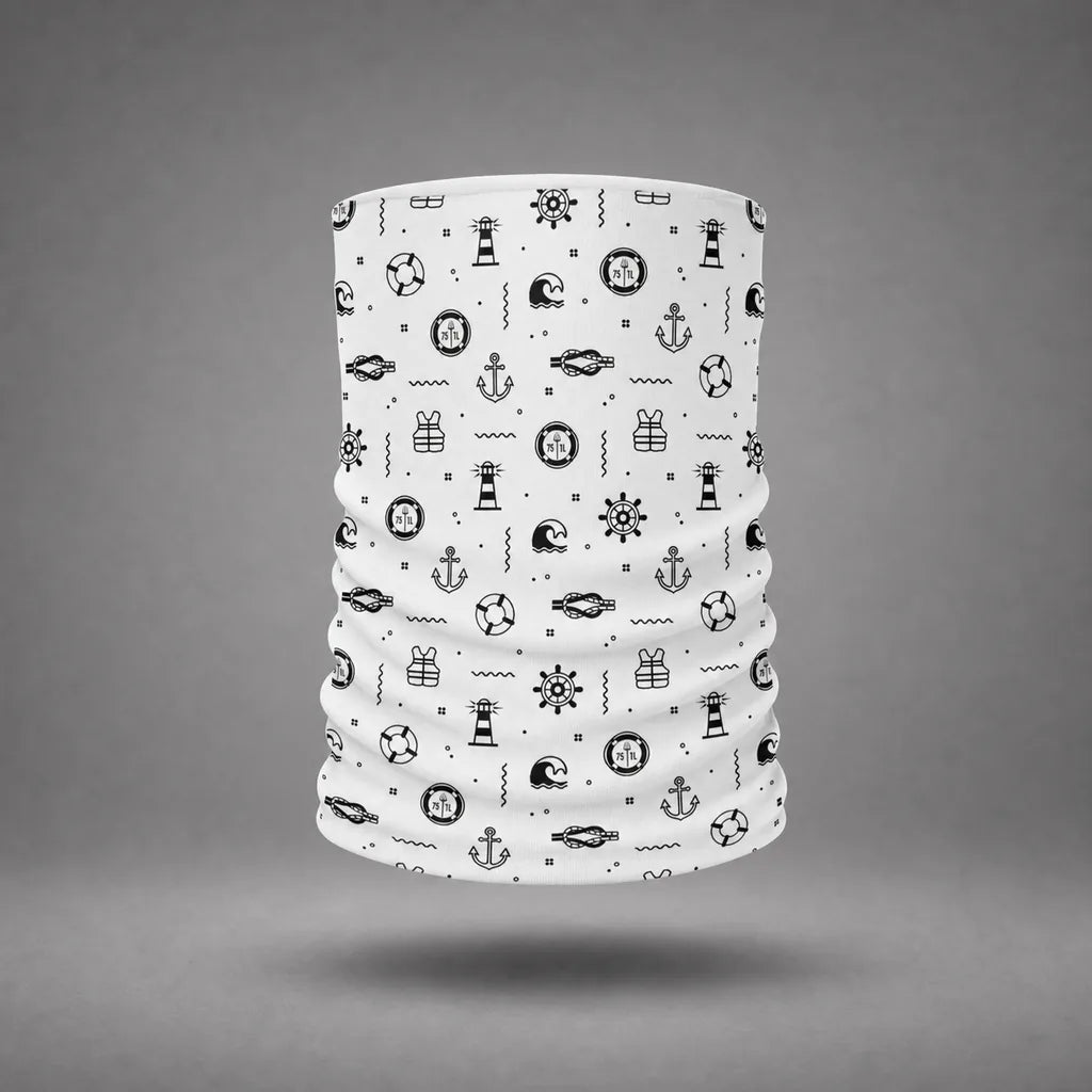 White deck work neck gaiter with black maritime symbol pattern, floating above a grey studio floor with a soft shadow.