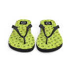 Nautical Pattern Flip Flops in lemon green on a cruise ship pool