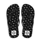7SHORT1LONG® Beach flip flops with nautical icon maritime design, black straps and textured sole for seaside activities.