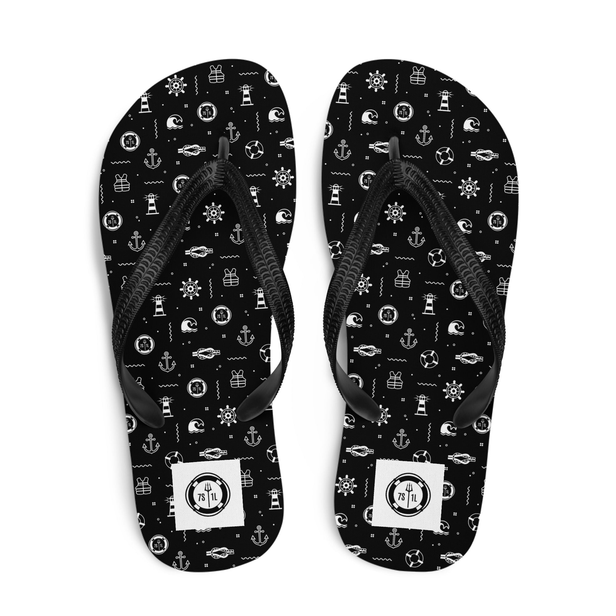 7SHORT1LONG® Beach flip flops with nautical icon maritime design, black straps and textured sole for seaside activities.