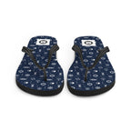 Pair of navy blue flip-flops with white pattern on a white background