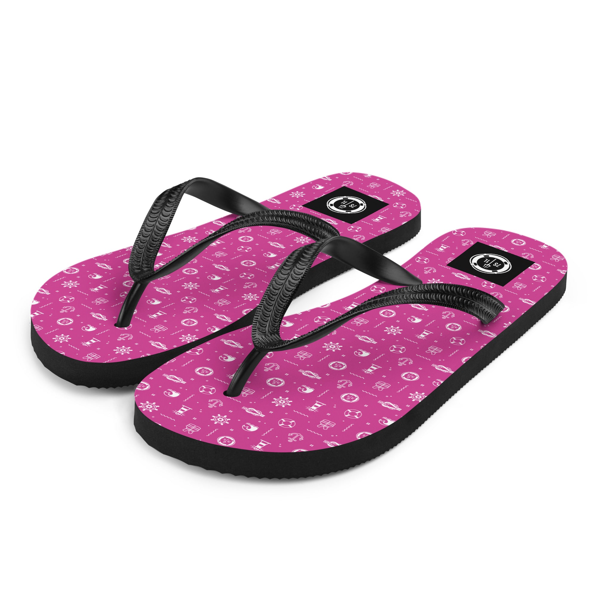 Pair of pink flip-flops with white maritime pattern on a white background