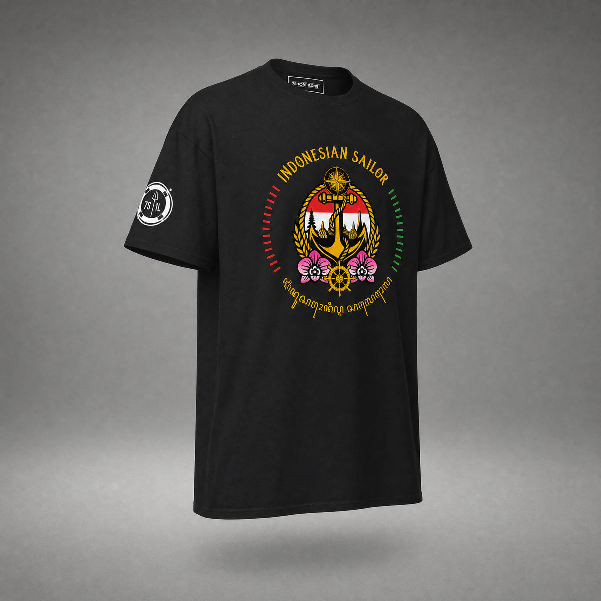 Black Indonesian Sailor T-shirt at a three-quarter angle, with the anchor and orchid crest on the chest and the lifebuoy badge on the sleeve.
