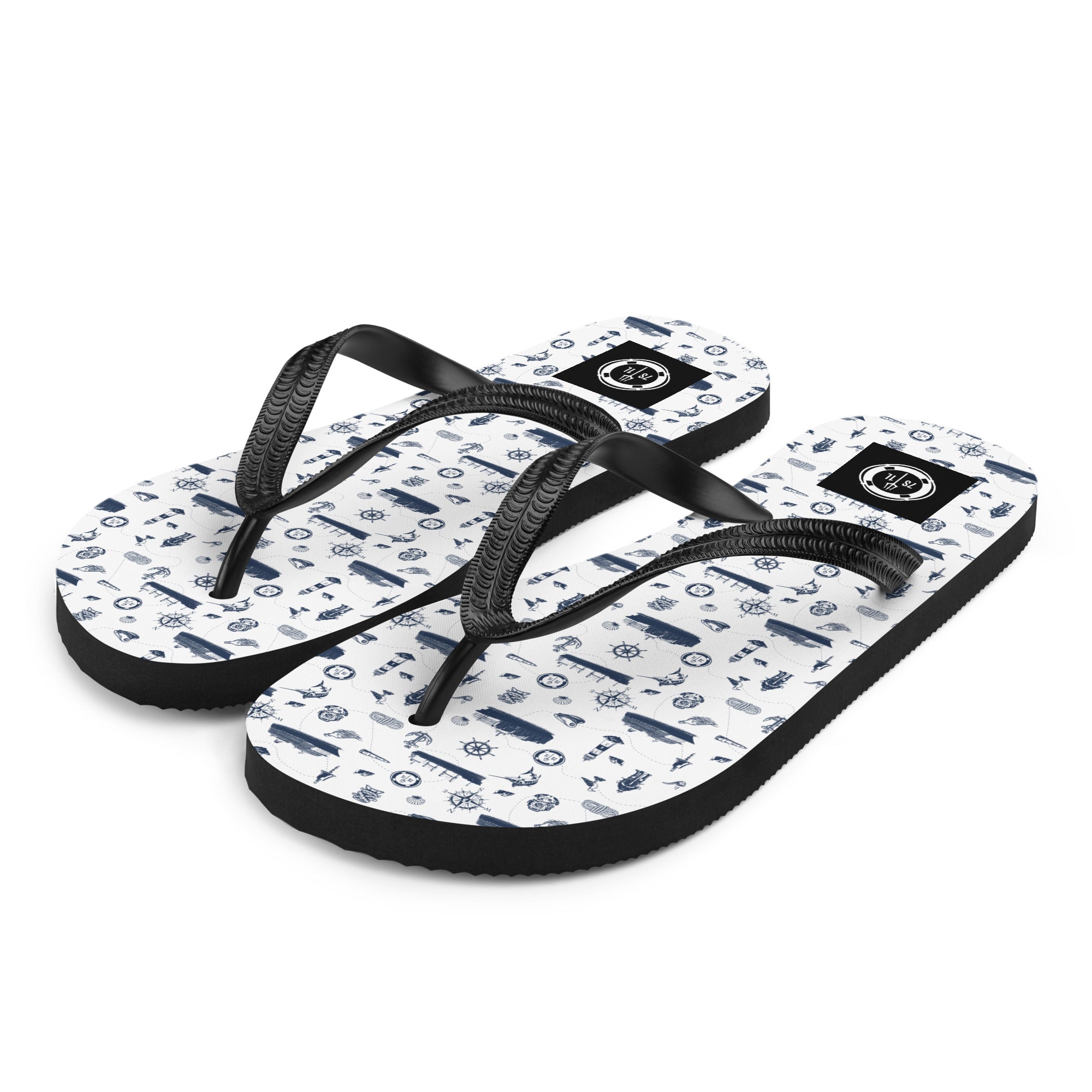 7SHORT1LONG® Coastal Cruise Flip Flops in white and navy with nautical pattern, featuring comfortable straps and beach-ready style.