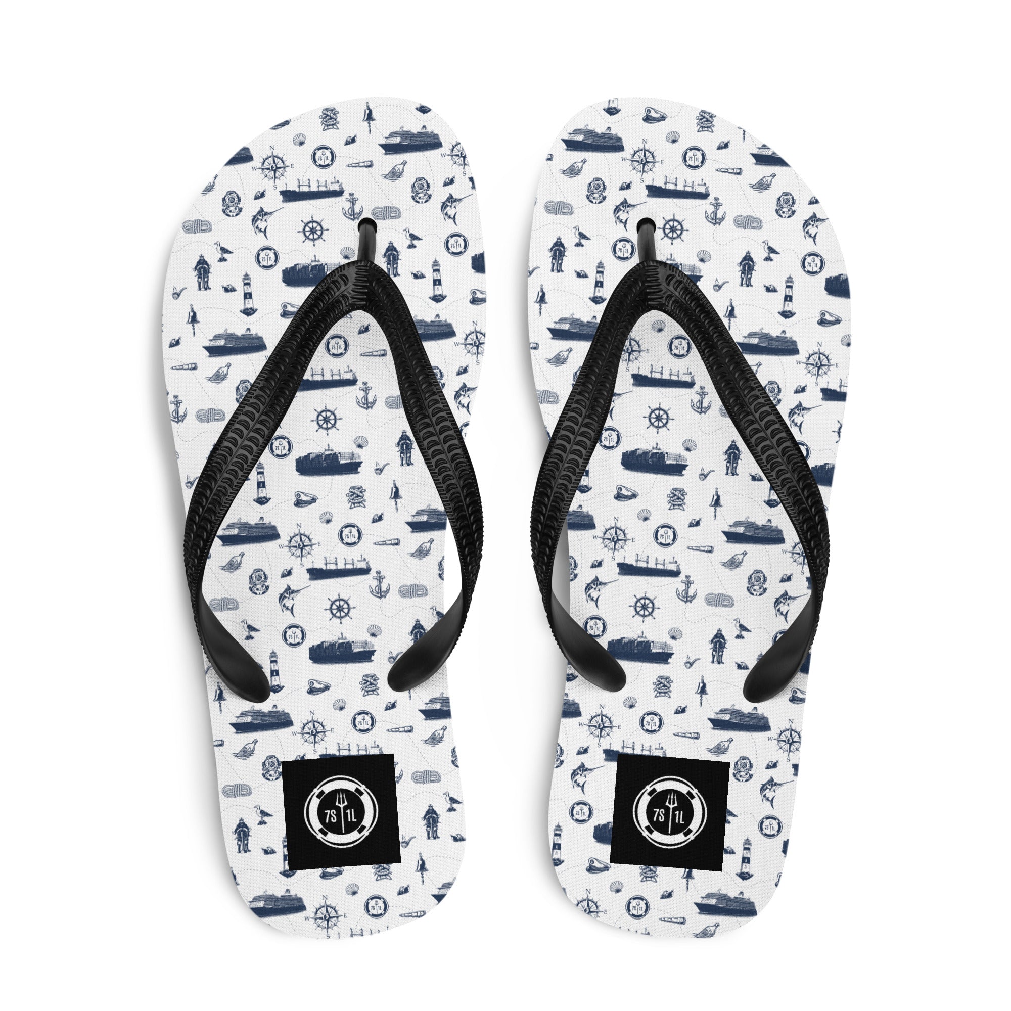 White and navy Coastal Cruise Flip Flops by 7SHORT1LONG® with nautical pattern, perfect for seaside and cruise wear.