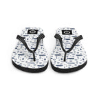 White and navy Coastal Cruise flip flops by 7SHORT1LONG® with nautical pattern, perfect for beach or casual wear.