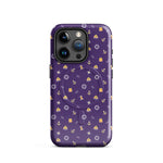 Purple phone case with a pattern of anchors and other nautical symbols on a white background