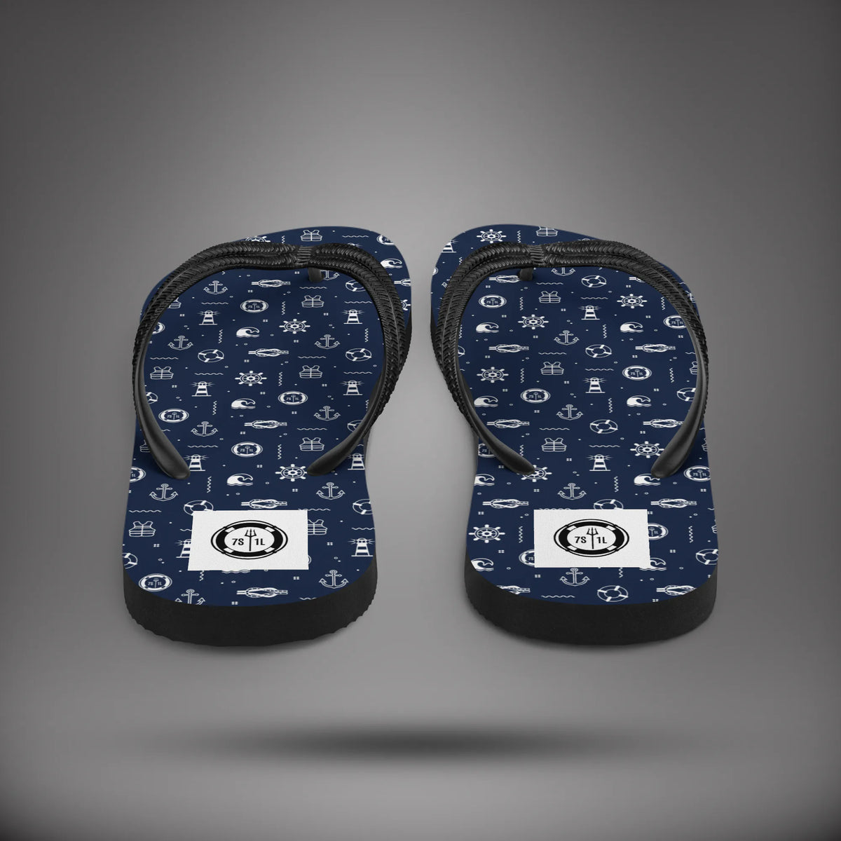 Nautical Icon flip flops seen from the heel, navy soles with white nautical icons and black straps