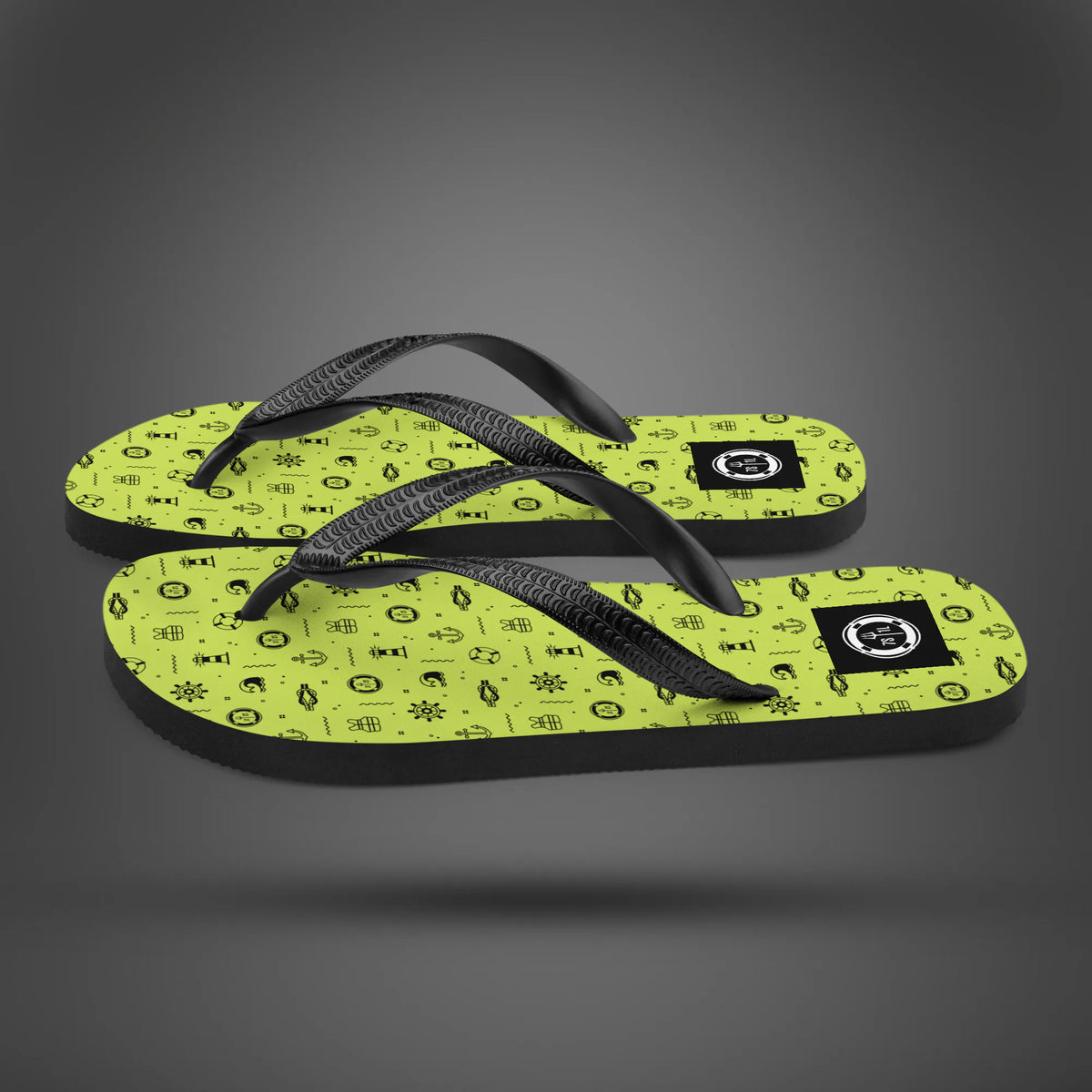 Nautical Summer flip flops in side view, lime green icon print soles with black straps