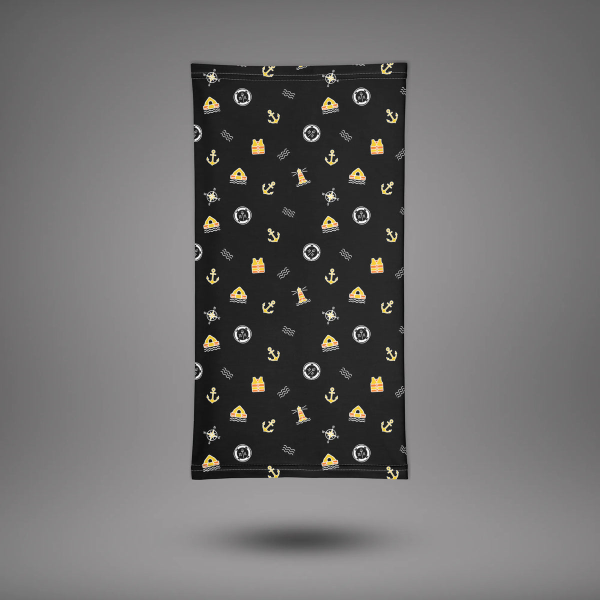 Safety at Sea neck gaiter laid flat, black fabric with gold anchor and nautical icons