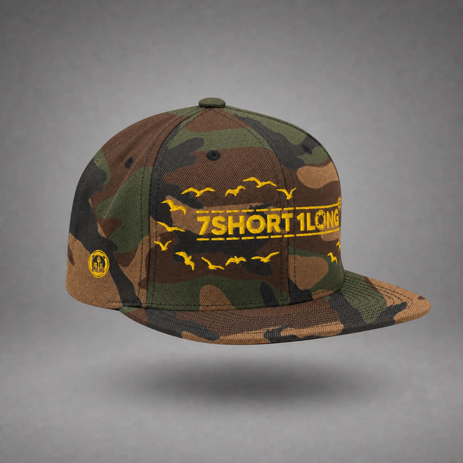 Green Camo Seagulls snapback cap shown from the left side in a gray floating studio.
