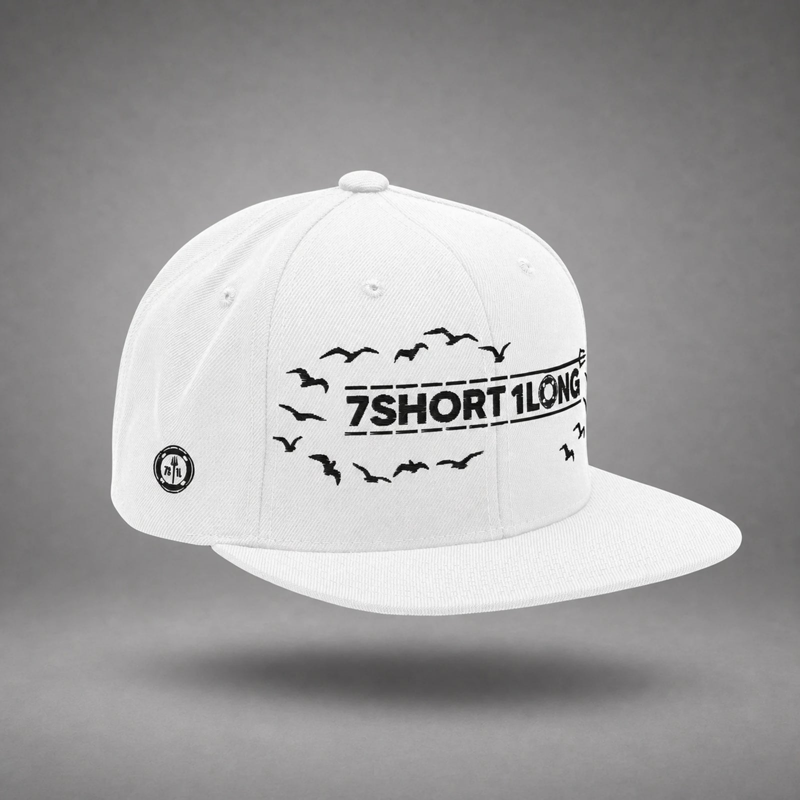 White Seagulls snapback cap shown from the left side in a gray floating studio.