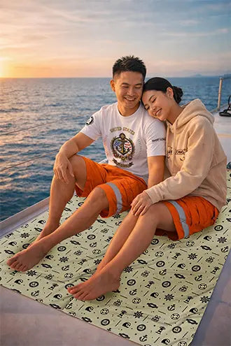 two sailor sitting an a maritime beach towel on a cargo ship
