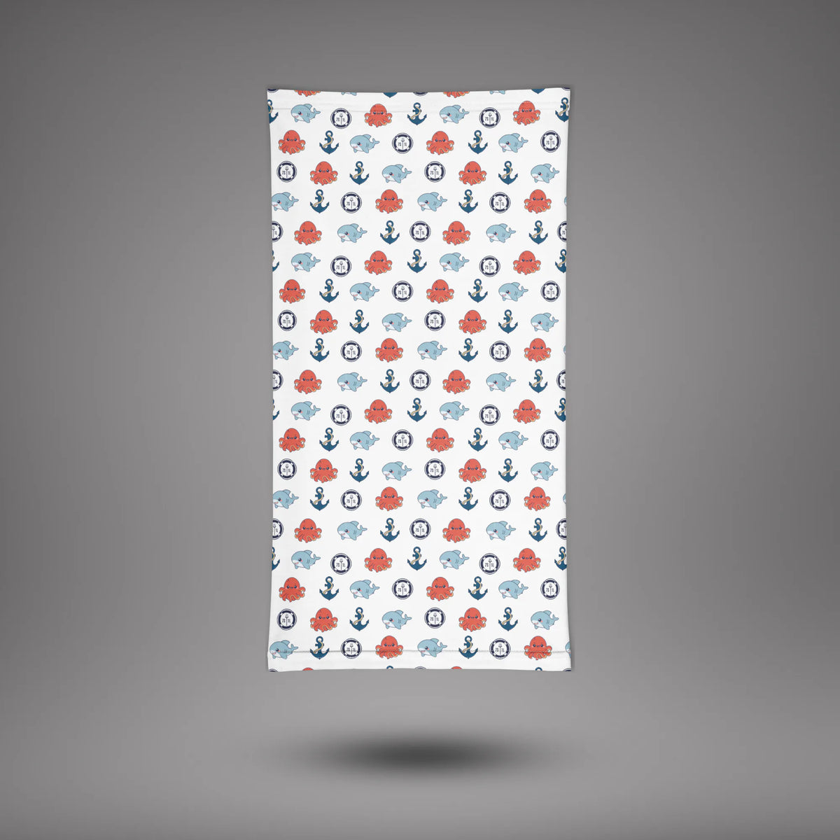 Shark and Octopus neck gaiter laid flat, white fabric with red and blue sea life icons