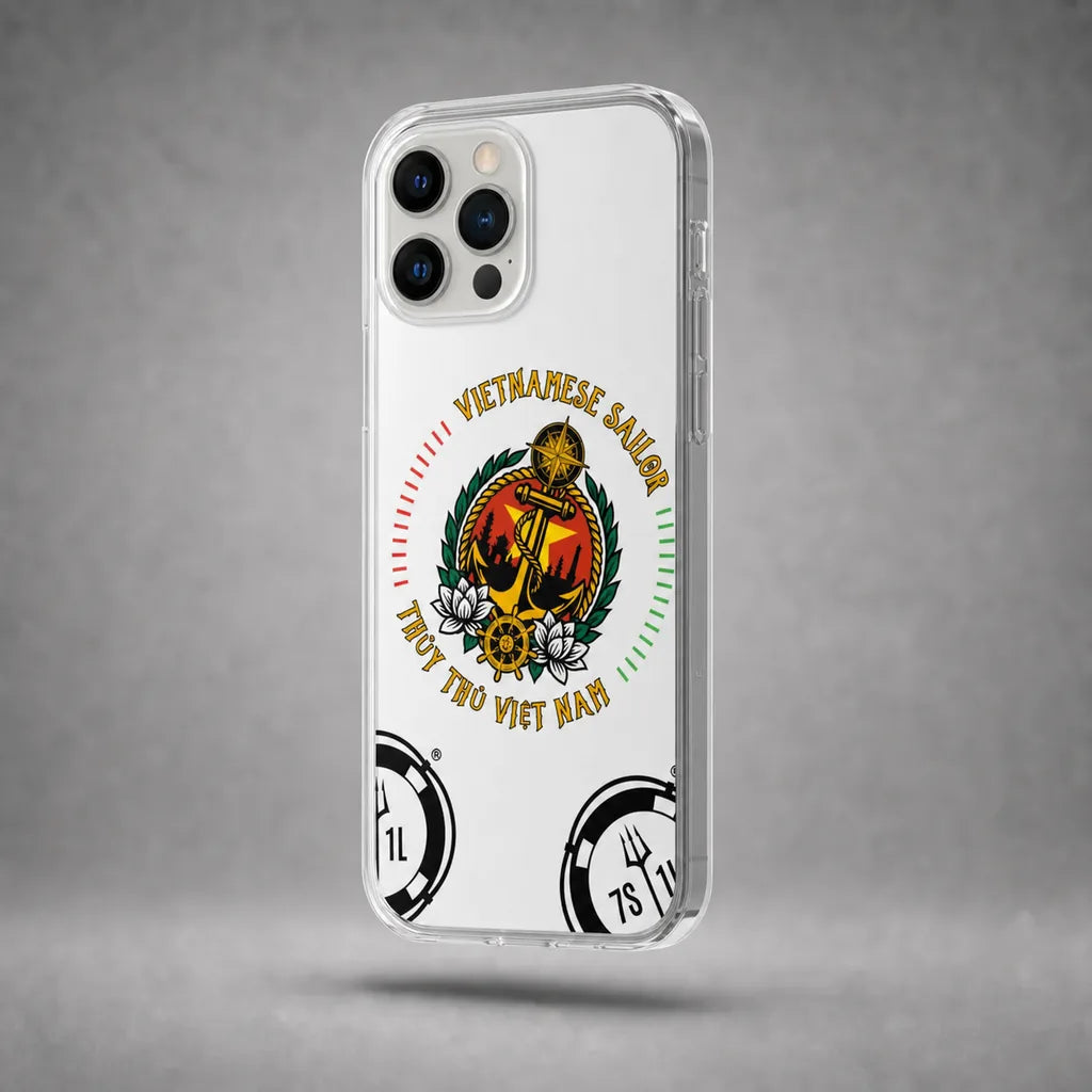 Clear Vietnamese Sailor case for iPhone 12 Pro with maritime anchor artwork, floating above a grey studio floor with a soft shadow.